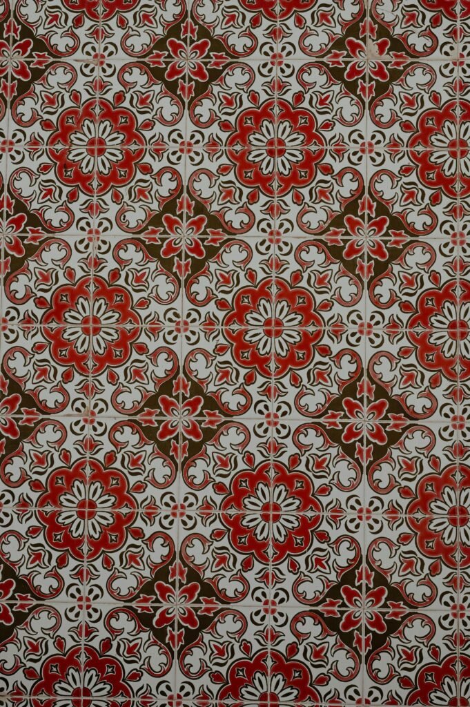 Detailed image of traditional Portuguese ceramic tiles with a floral mosaic design.